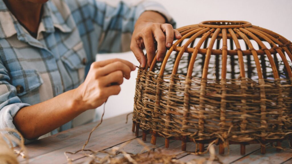 Local artisan weaving a handcrafted basket in Ubud