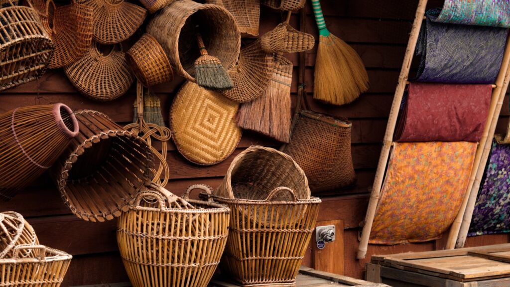 Handcrafted woven baskets and textiles displayed at a local artisan market